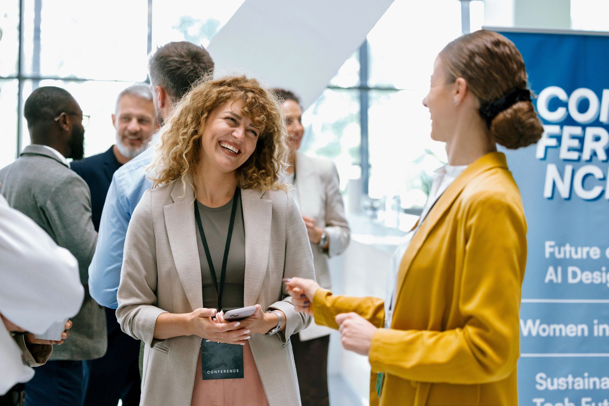 Group of professionals networking at a community event